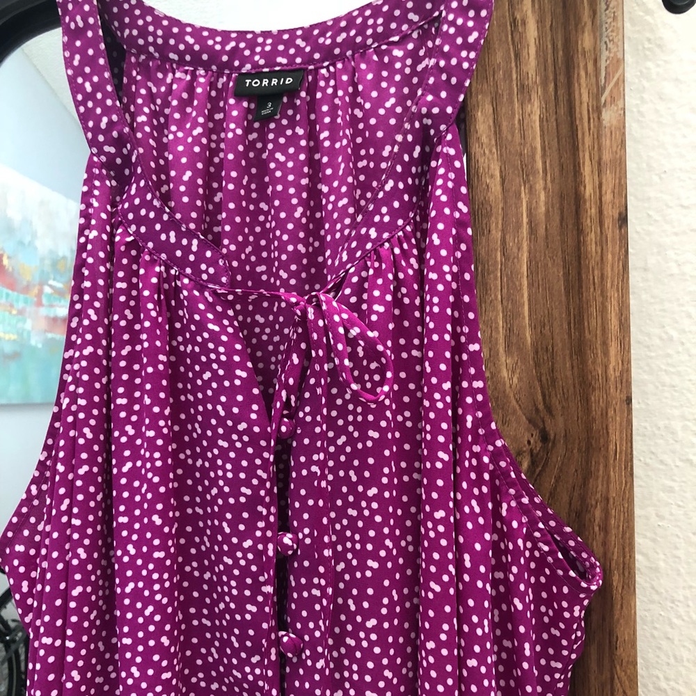 Purple with white polkadot top by Torrid
